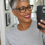 Short gray tapered pixie with cropped sides and a textured top