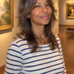 Long shag haircut with soft face-framing layers and airy ends for fine hair